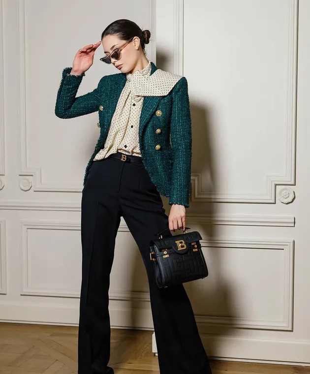 Balmain Pantaloni a zampa di lana neri BF1PO105WC09