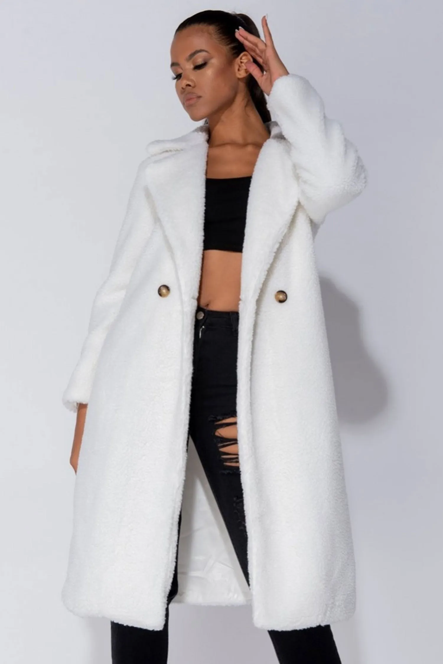 Cappotto teddy beige lungo con tasche