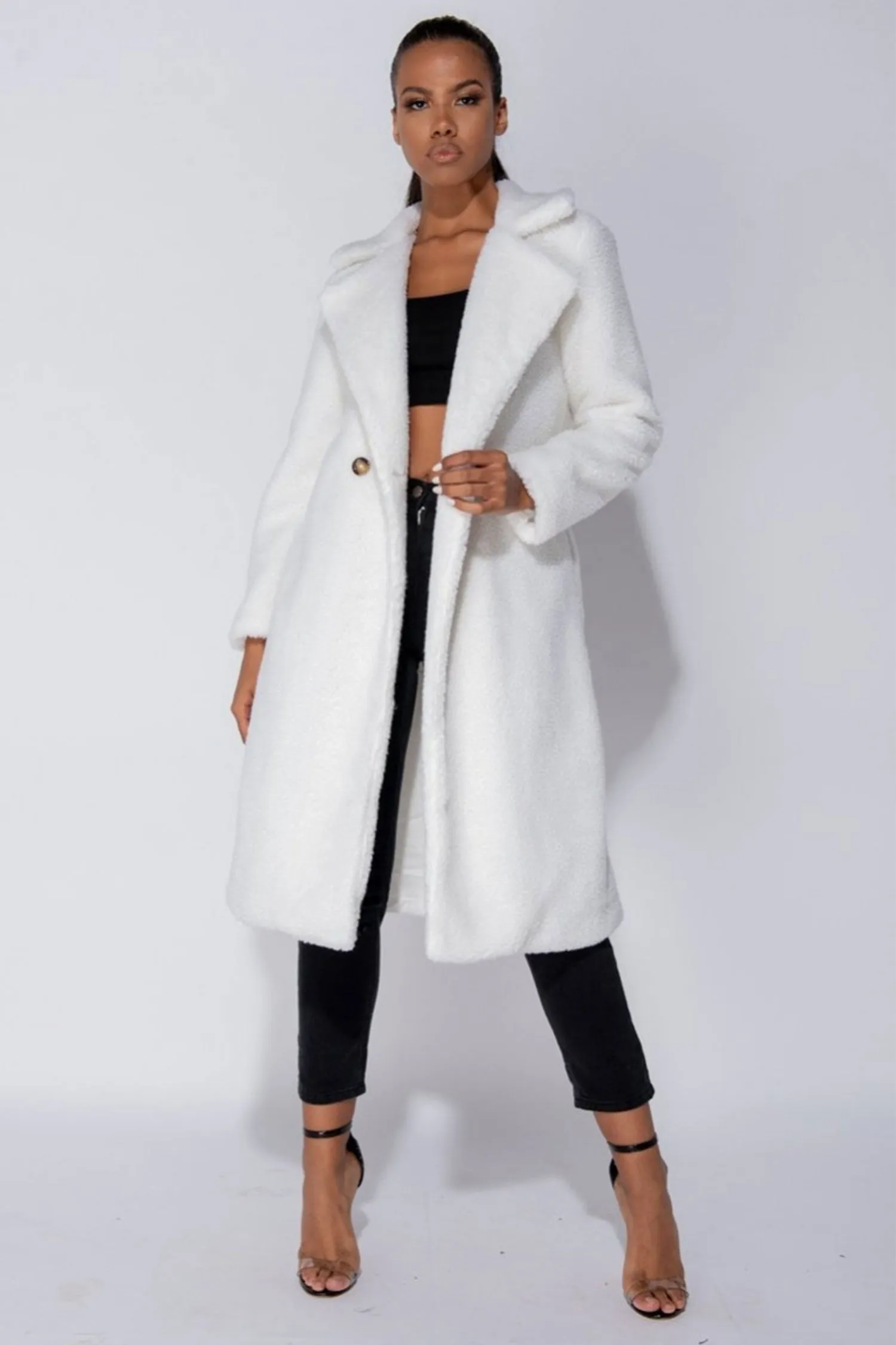 Cappotto teddy beige lungo con tasche