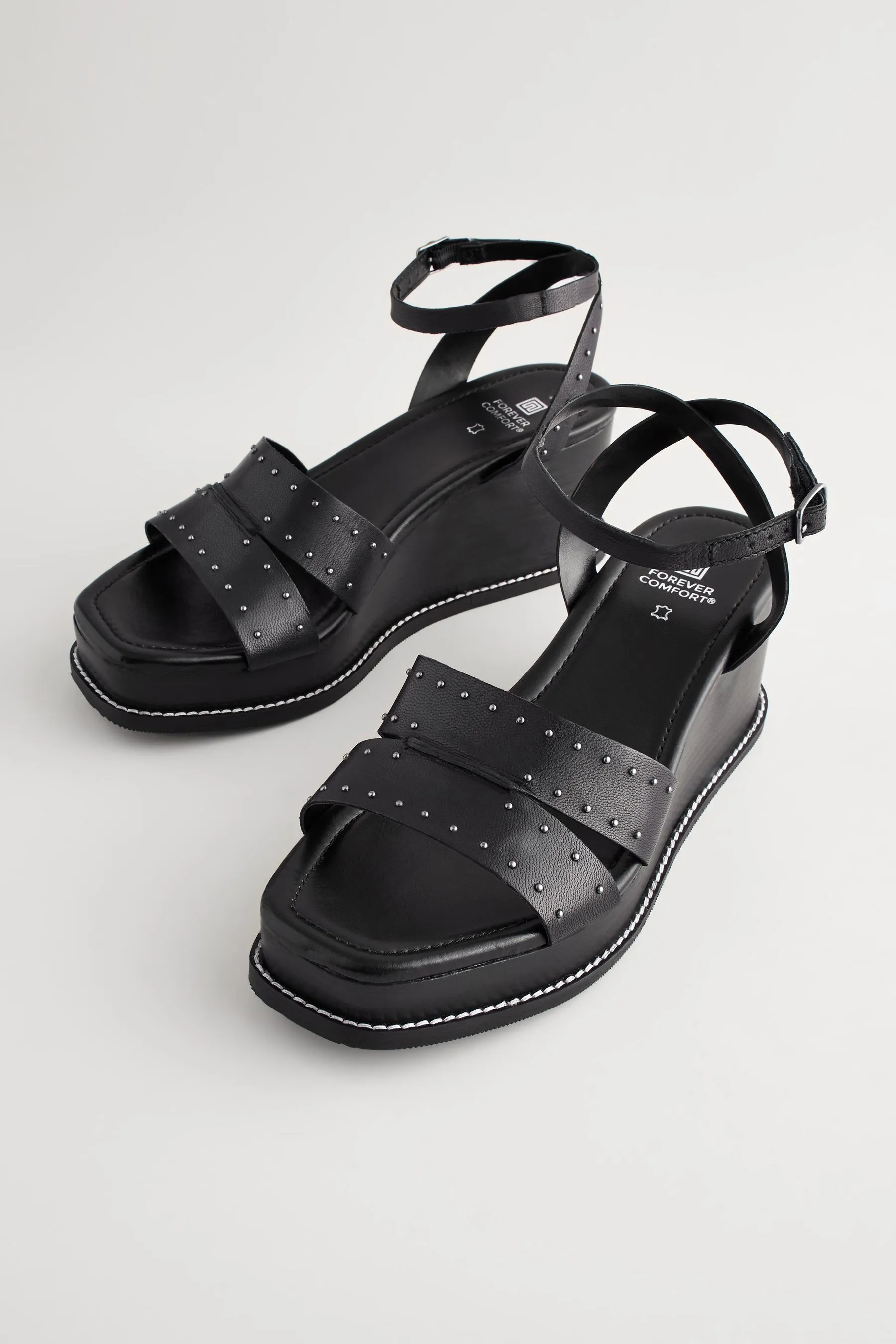 Forever Comfort - Zeppe in pelle con borchie