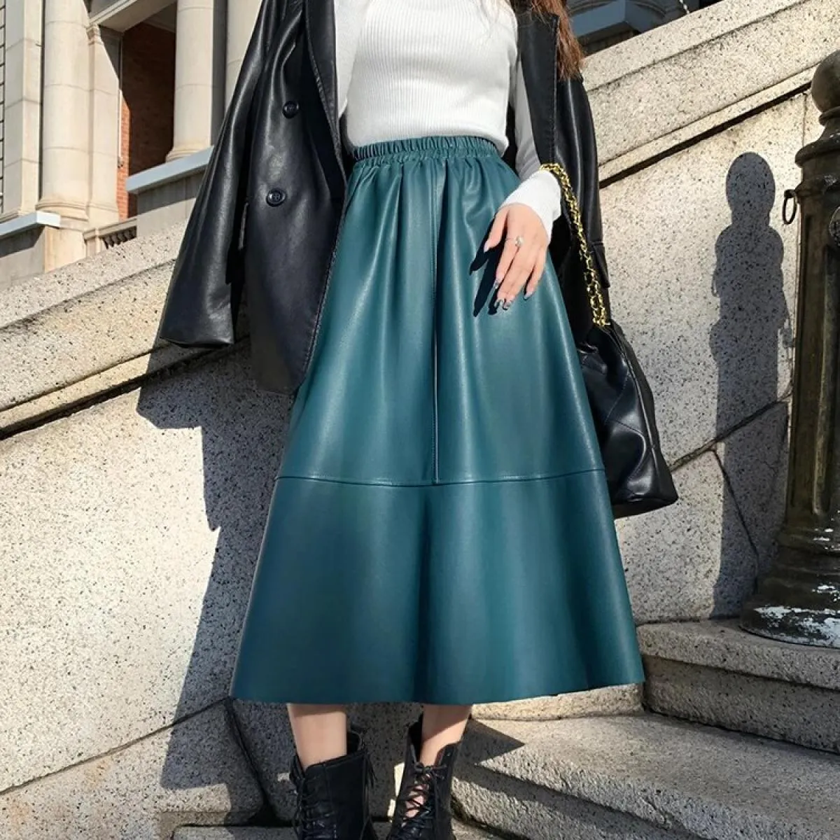 Gonne in pelle Pu 2023 autunno inverno nuova mezza gonna a vita alta sottile elegante morbida gonna ombrello in pelle a linea