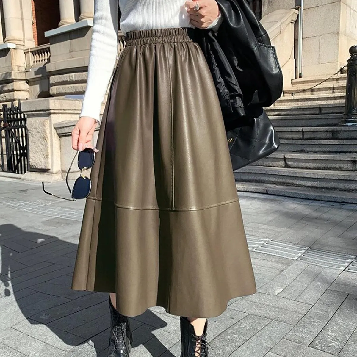 Gonne in pelle Pu 2023 autunno inverno nuova mezza gonna a vita alta sottile elegante morbida gonna ombrello in pelle a linea