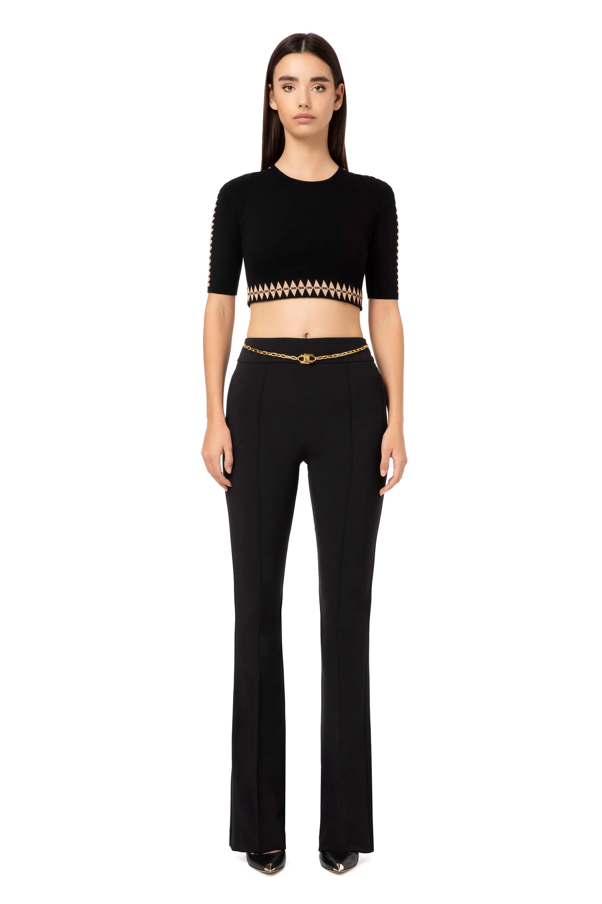 Pantalone a zampa con catena