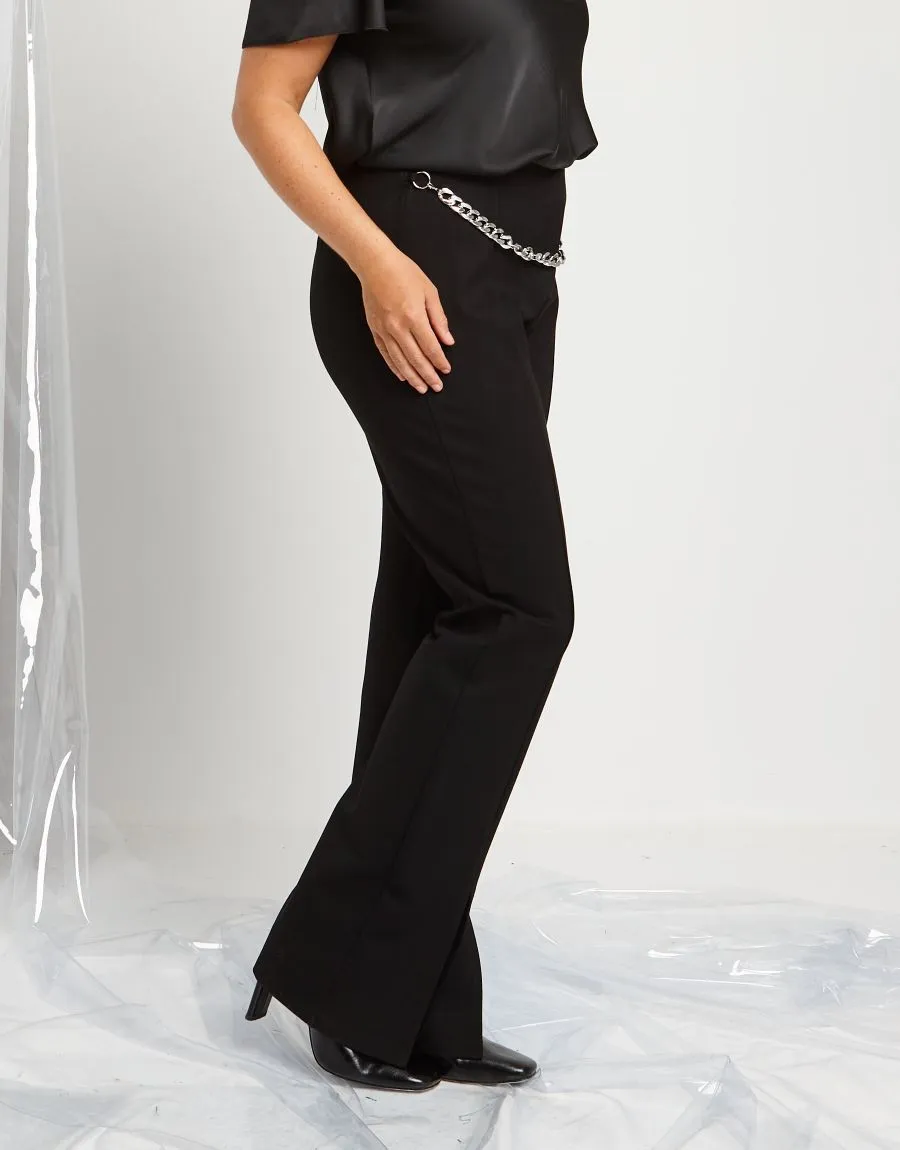 Pantalone a zampa con spacco e catena