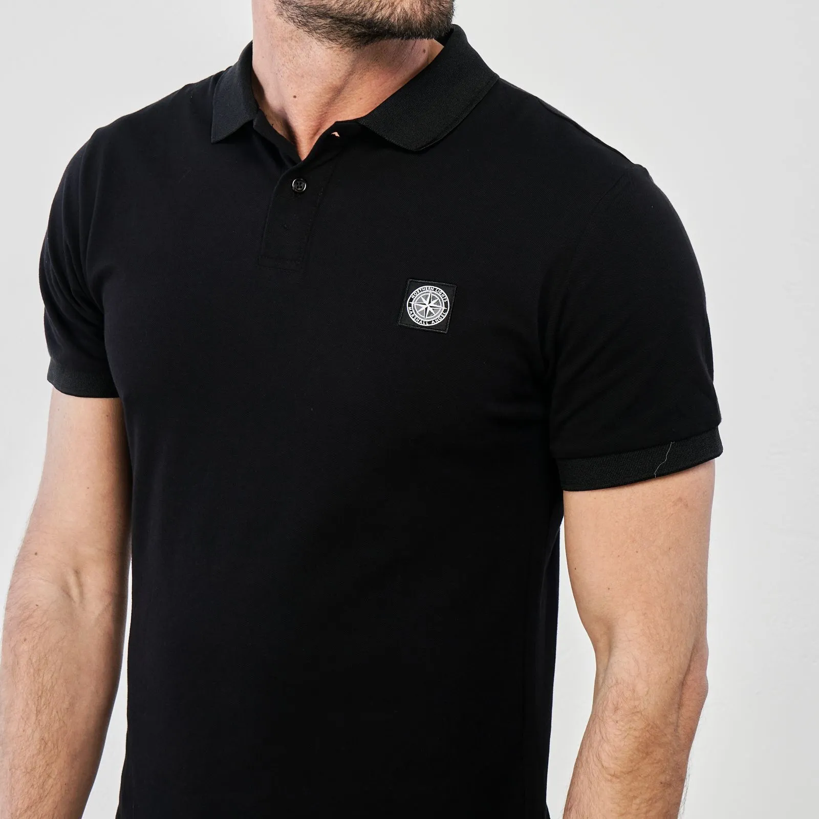 Polo nera maniche corte con logo